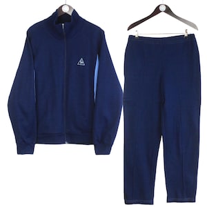 Vintage Le Coq Sportif trainingspak maat M blauw jaren 90 retro sportstijl trainingspak sweater en joggingbroek broek jumpsuit