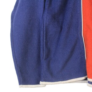 May include: A set of three ceramic mugs with a speckled, matte finish in cream, light grey, and dark grey. Each mug has a simple, minimalist design, ideal for coffee or tea.