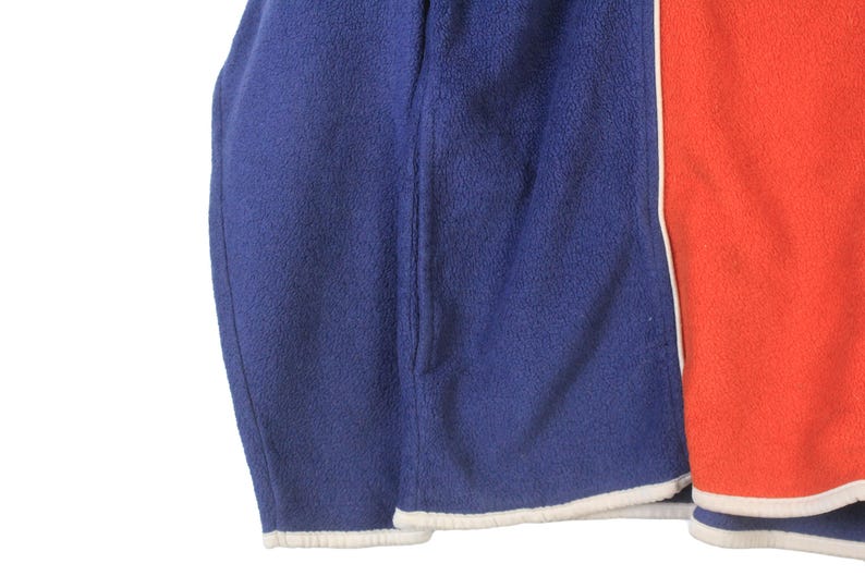 May include: A set of three ceramic mugs with a speckled, matte finish in cream, light grey, and dark grey. Each mug has a simple, minimalist design, ideal for coffee or tea.