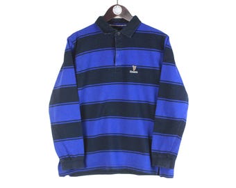 ヴィンテージ ギネス ラグビーシャツ サイズ レディース M/L ブルー 00年代 セーター プルオーバー ジャンパー 冬 アウトドア スキースタイル