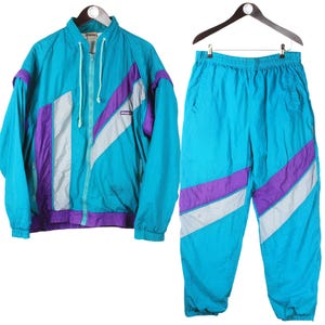 Vintage Ellesse trainingspak maat M blauw jaren 90 retro sportstijl trainingspak jasje en broek jumpsuit