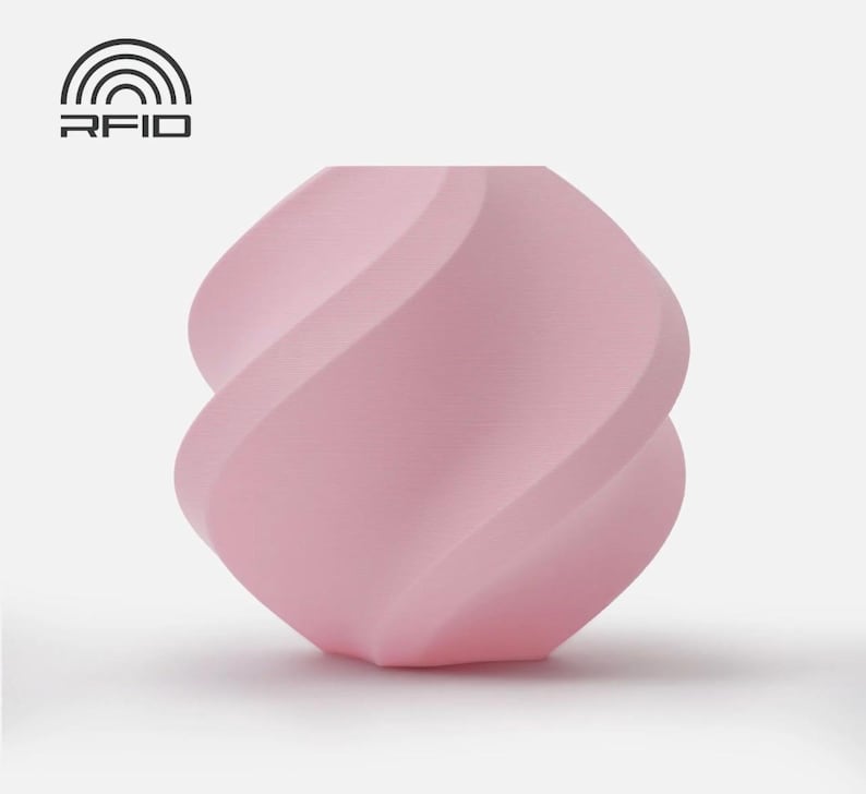 May include: A light pink, abstract, geometric sculpture with a twisted, spiral design. The sculpture has a smooth surface and is set against a plain white background. The top left corner features the text "RFID" above a graphic of a radio wave.