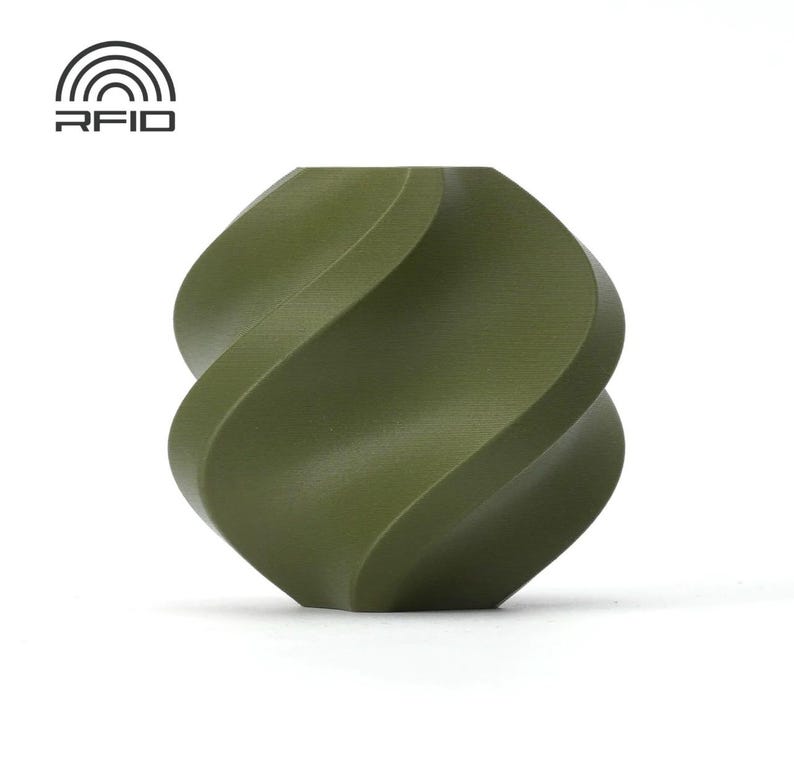May include: An olive green, abstract, sculptural object with a twisted, symmetrical design. The object has a smooth, matte finish and is set against a white background. The RFID logo is in the upper left corner.