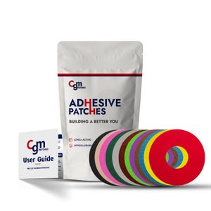 May include: A white bag with the text "Com Patches Adhesive Patches Building a Better You" and the text "Long-Lasting Hypoallergenic" on the front. The bag is next to a stack of 10 round, pre-cut adhesive patches in various colors, including red, orange, yellow, green, blue, purple, brown, gray, pink, and black. A user guide with the text "Com Patches User Guide Pre-Cut Adhesive Patches" is also included.