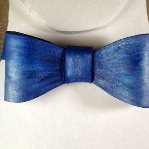 Genuine Leather Bow Tie. Hand Painted Sapphire Blue, Pre-tied. Matching Neckband adjusts by hook and loop fastener tape. Wearable Art.