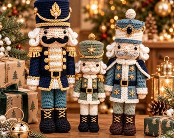 May include: Three crocheted nutcracker dolls standing in a row. The left doll wears a navy blue uniform with gold trim. The center doll is green with gold accents. The right doll is light blue and white with gold snowflake details.