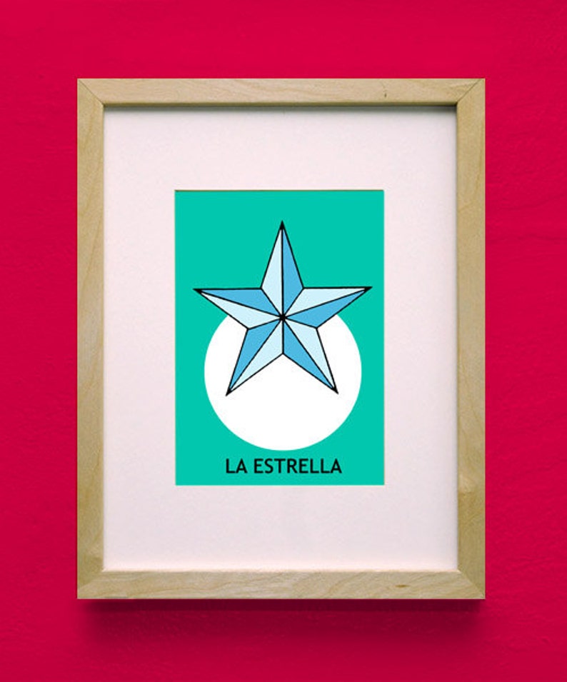 May include: A framed print of a blue and white star with a white circle around it on a teal background. The text "LA ESTRELLA" is printed below the star.