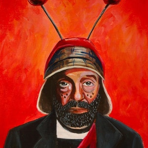 May include: A painting of a person wearing a red hat with two red antennas on top. The person has a black beard and is wearing a black jacket and a white and black striped shirt. The background is red.