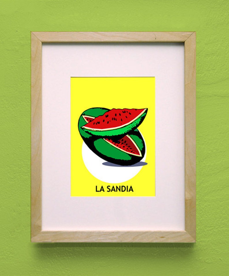May include: A framed print of a watermelon illustration with the text "LA SANDIA" on a yellow background.