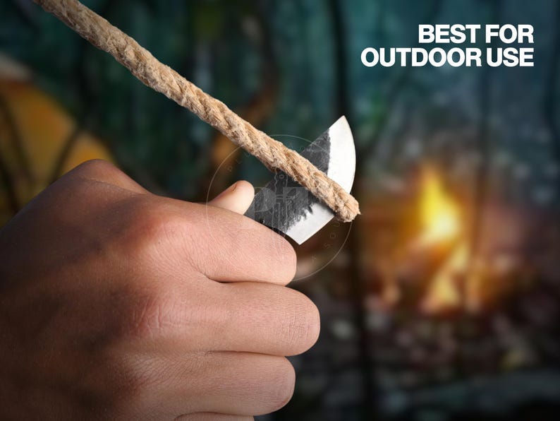 May include: A close-up of a hand holding a small, sharp knife against a rope. The knife has a dark, textured blade and a light-colored handle. The rope is thick and tan. Text in the image reads "BEST FOR OUTDOOR USE."