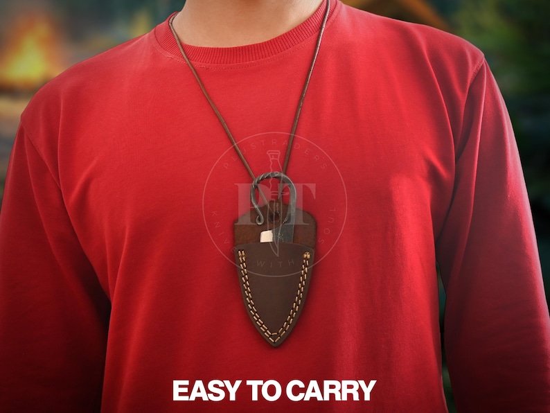 May include: A brown leather necklace with a small knife in a matching sheath. The sheath is stitched with white thread and hangs from a brown leather cord. The text "EASY TO CARRY" is at the bottom of the image.