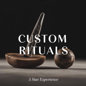 May include: A wooden bowl with a clear glass tool and a textured sphere. The text "CUSTOM RITUALS" is displayed in white, along with "5 Star Experience" at the bottom. The background is dark.