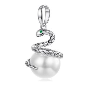 May include: A silver pendant with a snake design wrapped around a white pearl. The snake has detailed scales and a small green gem for an eye. The pendant has a loop for a chain.