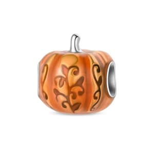 May include: A silver charm in the shape of a pumpkin with orange and brown enamel. The pumpkin has a silver stem and decorative swirls. The charm is designed to be added to a bracelet or necklace.