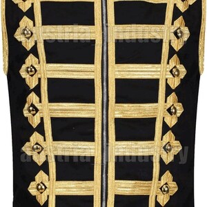 May include: A black sleeveless jacket with gold trim and buttons. The jacket has a zipper closure and a pointed hem.