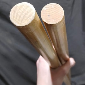 2 (two) kiln dried hardwood dowels rods approximately 5' + inches tall and 1" inch diameter. great for woodworking projects! long rods!