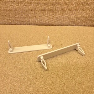 May include: A set of three ceramic mugs with a speckled, matte finish. The mugs are in shades of cream, light gray, and dark gray. Each mug has a simple, minimalist design, perfect for coffee or tea.