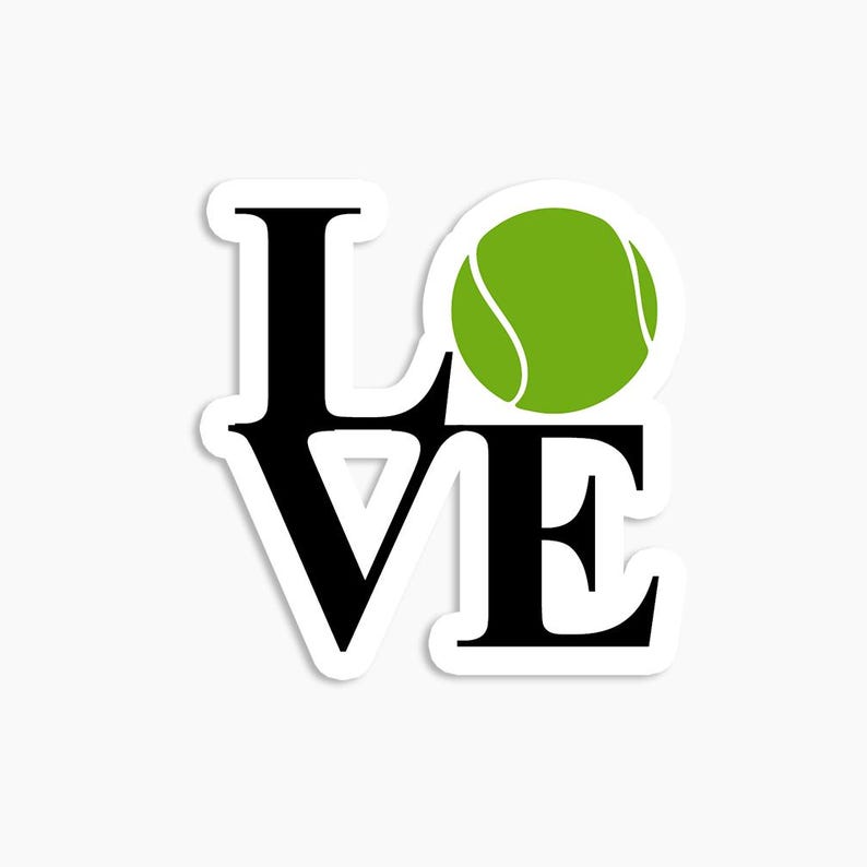 May include: A black and white sticker with the word "LOVE" in large letters. A green tennis ball is in the center of the word.
