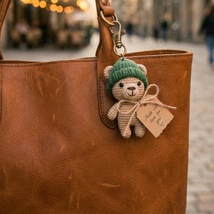 May include: A rustic wooden sign with the text "Welcome to our home" in white lettering. The sign features a distressed finish and a simple, inviting design, perfect for entryway decor.