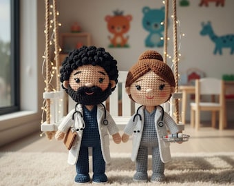 May include: Crocheted doctor dolls, a male and female, stand holding hands on a swing. The male doll has a black beard and holds a notepad. The female doll holds a tray of medical supplies. Both wear white coats and stethoscopes.