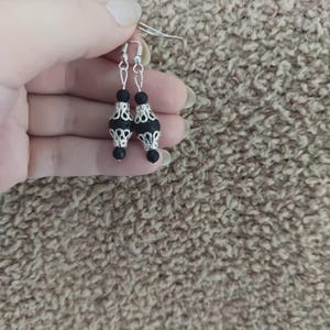Black and silver drop earrings