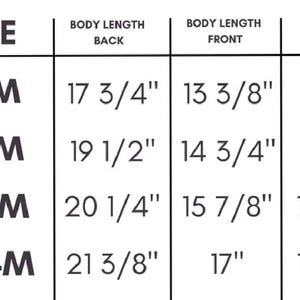 May include: A black and white size chart table for infant clothing. Columns include Size, Body Length Back, Body Length Front, and Chest Width (Laid Flat). Rows list measurements in inches for sizes 0-6M, 6-12M, 12-18M, and 18-24M, ranging from 9 3/8" to 21 3/8".