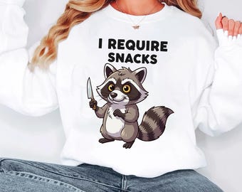 Funny Raccoon Holding Knife PNG  I Require Snacks  Cute Forest Animal Clipart  Hungry Cartoon Critter  Snack Quote Sublimation Design