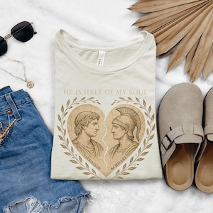 a pair of shoes, a t - shirt, and a pair of denim shorts