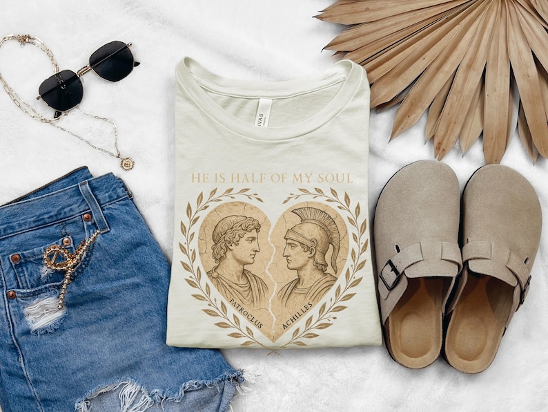 a pair of shoes, a t - shirt, and a pair of denim shorts