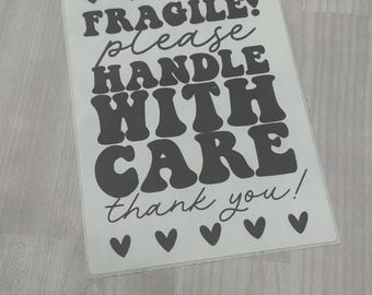 Etiquetas térmicas de 4 x 6 pulgadas para embalajes de pequeñas empresas. Manipule con cuidado.