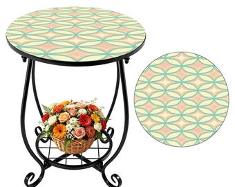 Vintage roze retro jaren 50 bijzettafel buiten, moderne terrastafel uit het midden van de eeuw, tuinmeubeldecor in MCM-stijl midden van de eeuw modern