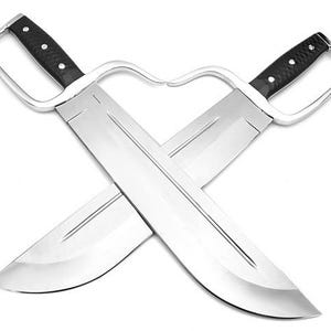 May include: A pair of silver-coloured martial arts swords with black handles, crossed in an X shape.