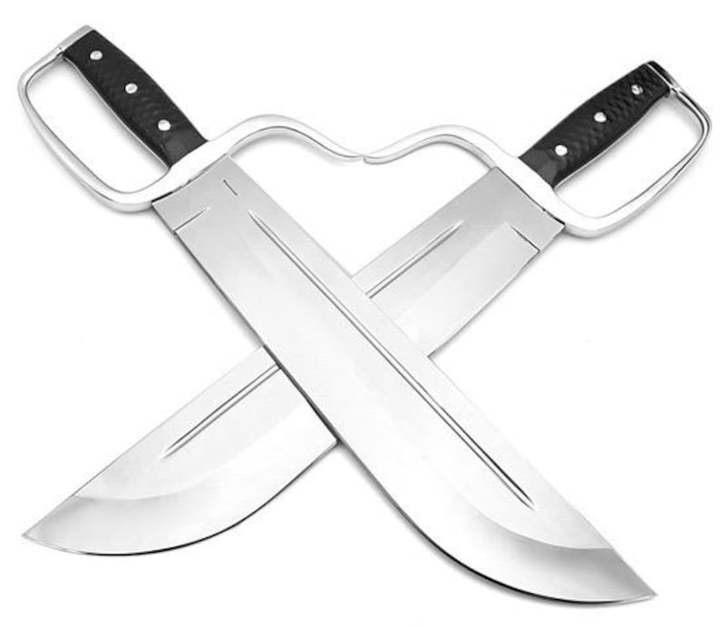 May include: A pair of silver-coloured martial arts swords with black handles, crossed in an X shape.