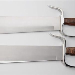 May include: Two silver-coloured double-edged swords with wooden handles. The handles have a brown and black wood grain pattern.