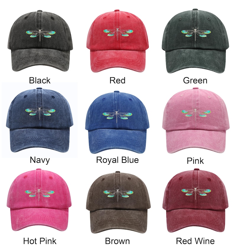 May include: A collection of baseball caps in various colors, including black, red, green, navy, royal blue, pink, hot pink, brown, and red wine. Each cap features a dragonfly design embroidered on the front.