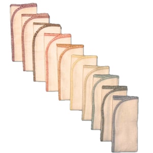 May include: A set of 10 cotton cloths with different colored hems. The cloths are folded in a diagonal stack, with the hems facing out. The colors of the hems are a gradient from red to blue.