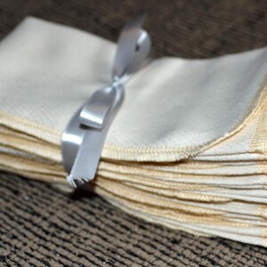 Pacote com 10 unidades cruas 11x12 costuradas com linha combinando · Feito à mão nos EUA!