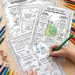 May include: A collection of educational coloring pages featuring insects and arachnids, including ants, bees, and spiders. The pages are filled with detailed illustrations and facts, with a child's hand coloring a page with a green pencil. Colored pencils are scattered around.