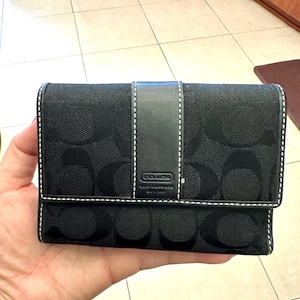 Portefeuille en cuir noir à trois volets en toile monogramme signature Coach, porte-monnaie Coach New York pour cartes de crédit, portefeuille Coach