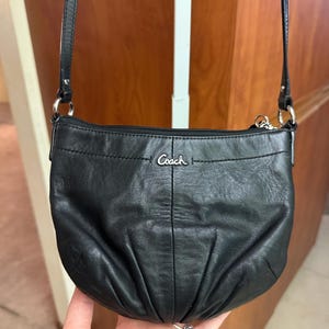 Sac à bandoulière Coach en cuir noir vintage