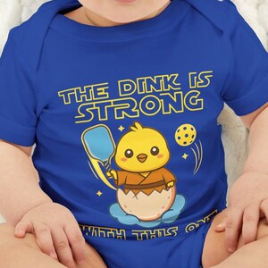 Future Pickleballer Onesie - The Dink is Strong With This One - Funny Sci Fi Baby Shower Gift - Infant Bodysuit - Pickleball Family Apparel