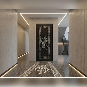 May include: A black door featuring a central white floral cutout design surrounded by a geometric border. The door is set within a concrete wall in a hallway with recessed floor lighting and a matching floral pattern on the terrazzo floor.