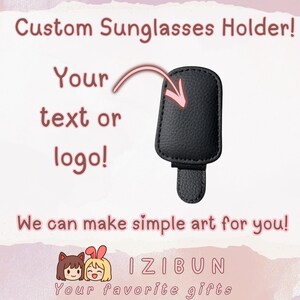 May include: A black custom sunglasses holder with the text "Custom Sunglasses Holder!" and "Your text or logo!" The holder has a textured surface and a loop for attachment. The text "We can make simple art for you!" is also visible.