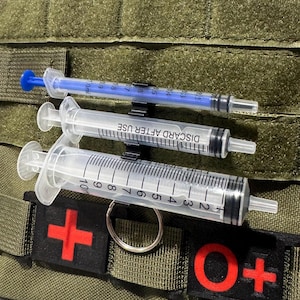 Syringe holder  1ml 3ml and 10/12 ml