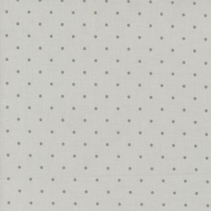 May include: A white fabric with a subtle texture and a repeating pattern of small gray dots.