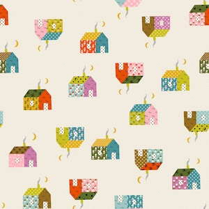 May include: A repeating pattern of colorful, patchwork houses with smoking chimneys and crescent moons on a cream background. The houses feature various patterns, including polka dots, hearts, and floral designs, in shades of orange, blue, green, and pink.