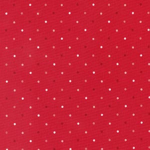 May include: Red fabric with a white polka dot pattern.