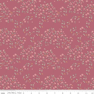 May include: A pink fabric with a small floral pattern. The flowers are in shades of pink, green, and brown. The fabric is perfect for quilting, sewing, and crafting.