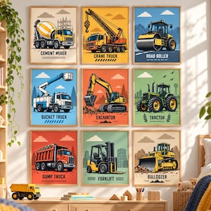 May include: A set of nine framed wall art prints featuring construction vehicles including a cement mixer, crane truck, road roller, bucket truck, excavator, tractor, dump truck, forklift, and bulldozer, each labelled with its respective name.
