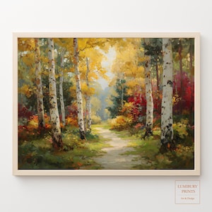 May include: A framed landscape painting of a forest path lined with white birch trees featuring yellow autumn leaves, green foliage, and red undergrowth. The bottom right corner contains a small rectangular label with the text LUMIBURY PRINTS Art & Design.
